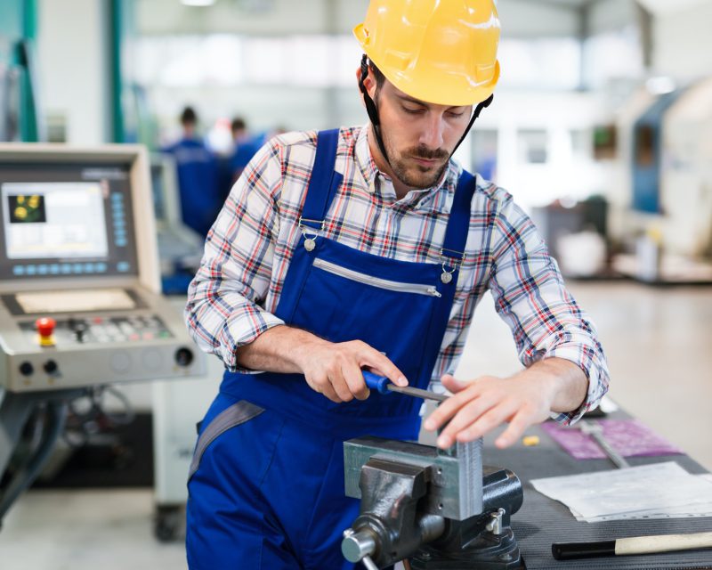 industrial factory employee working in metal manufacturing industry industrial factory employee working in metal manufacturing industry